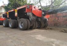 a red trailer with wheels